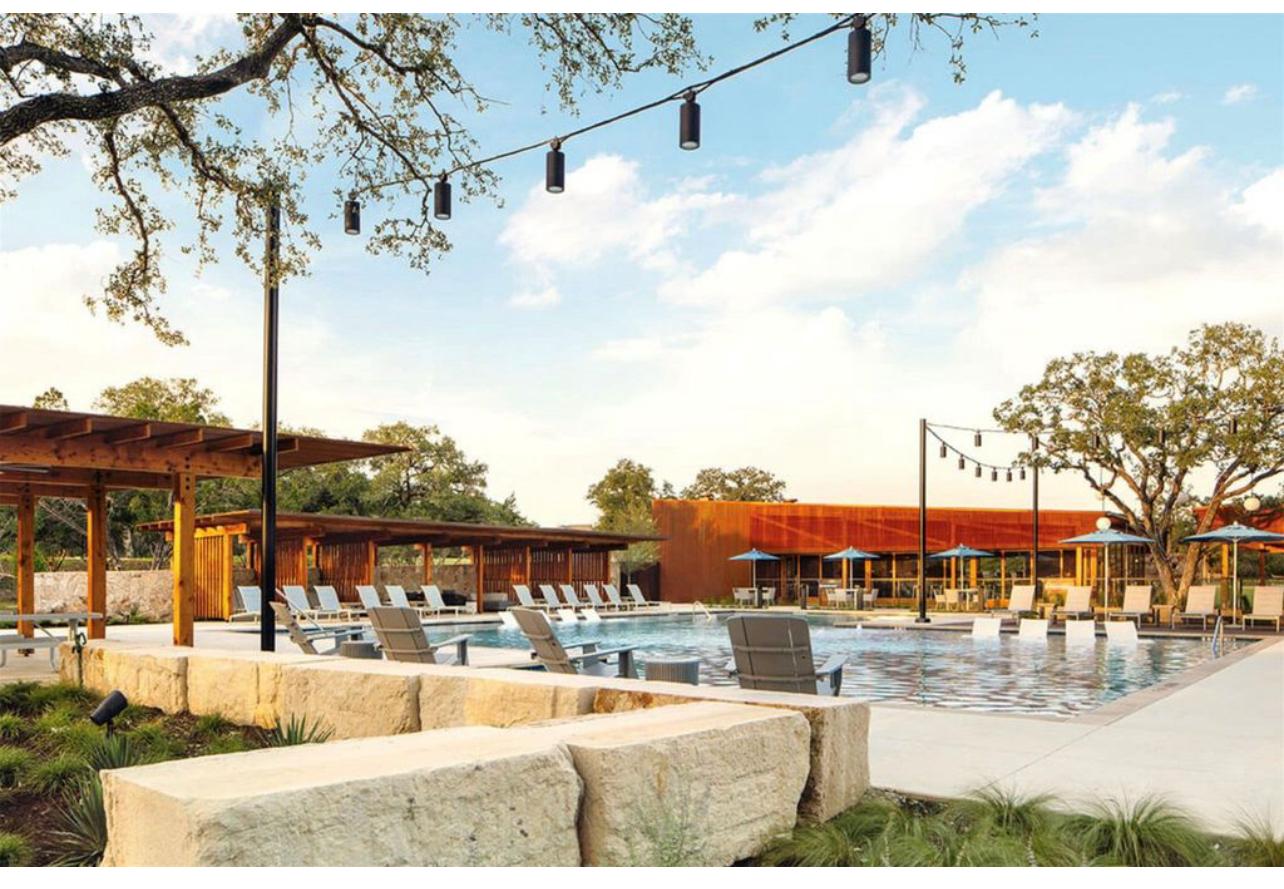 212 Saddle Mountain Road Georgetown, TX 78628 - Photo 32 of 38 a view of a swimming pool with a lawn chairs
