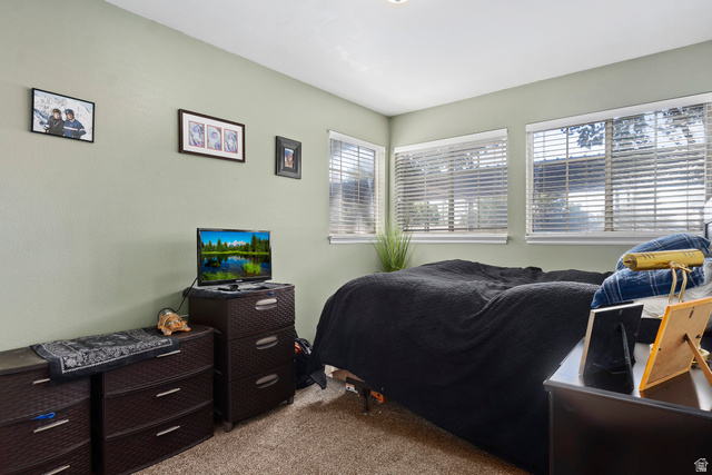 650 South Main Street, Unit 4104 Bountiful, UT 84010 - Photo 15 of 22 Bedroom with light carpet