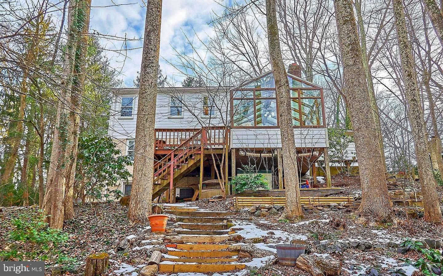 11312 Myrtle Lane Reston, VA 20191 - Photo 2 of 24 a view of a tall trees front of house