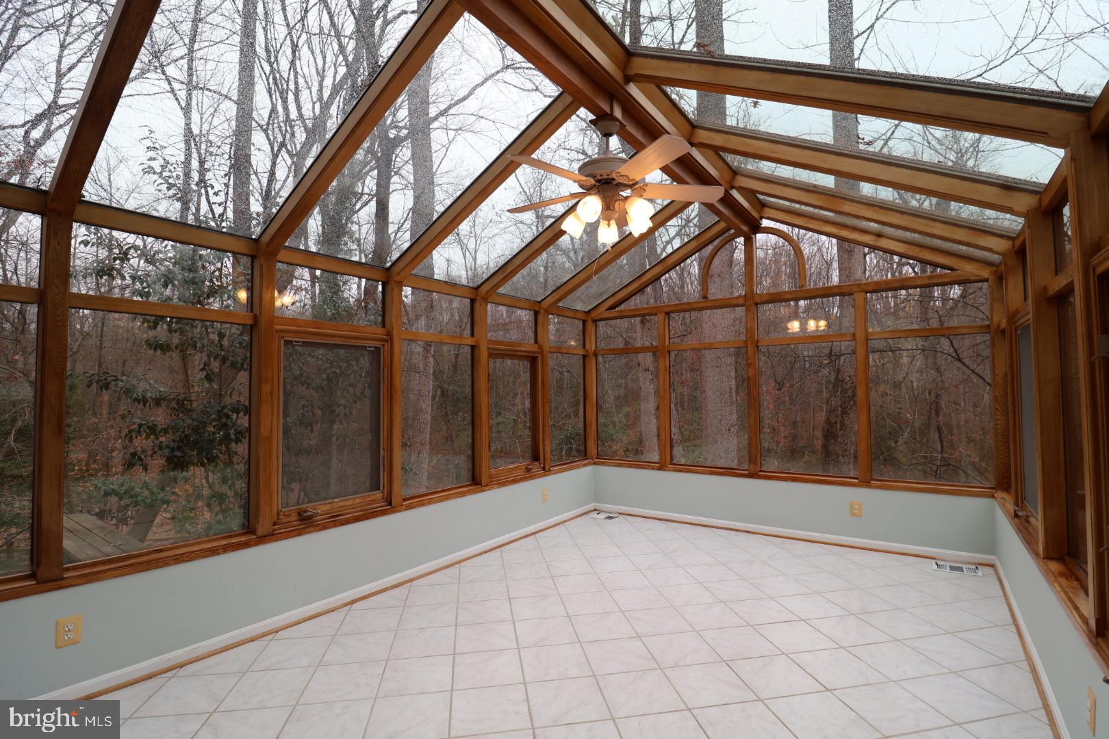 11312 Myrtle Lane Reston, VA 20191 - Photo 3 of 24 a view of backyard with large tree