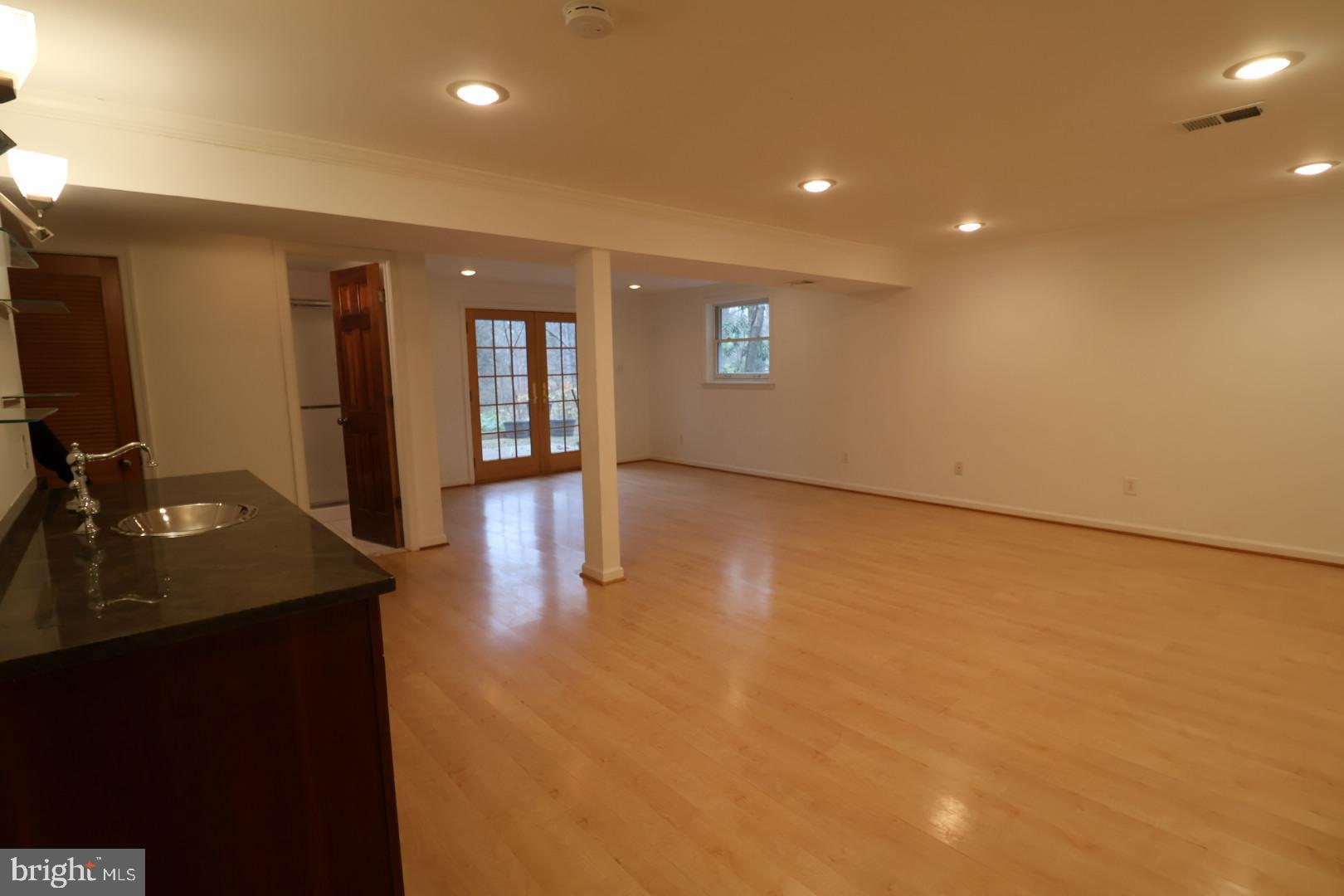 11312 Myrtle Lane Reston, VA 20191 - Photo 9 of 24 a view of a livingroom with wooden floor