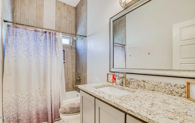 a view of a kitchen with a sink