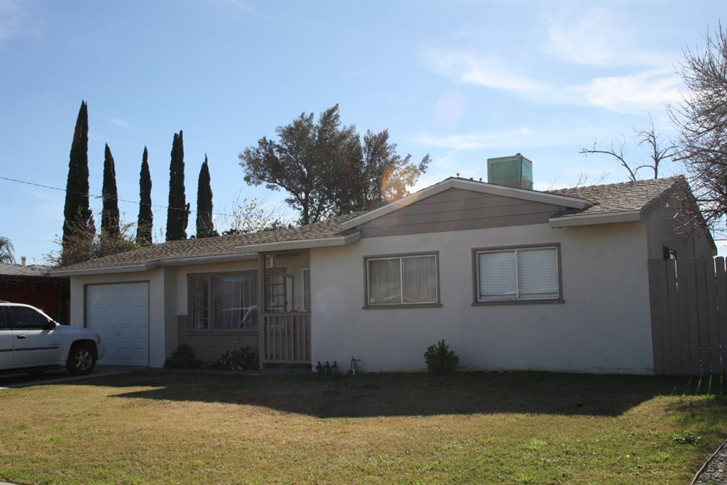 619 West 3rd Street Rialto, CA 92376 - Photo 1 of 1 a view of a house with a backyard