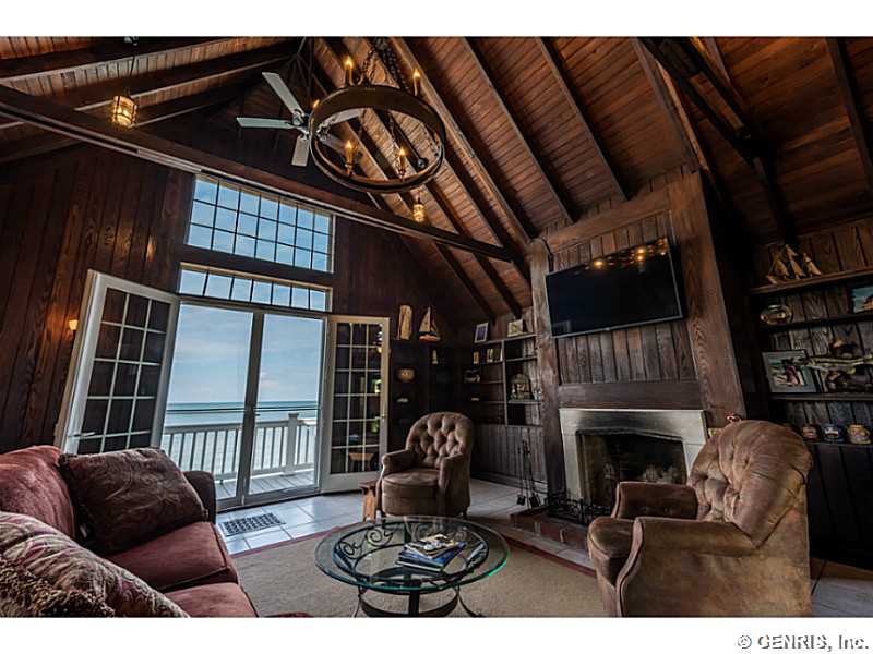 630 Rock Beach Road Irondequoit, NY 14617 - Photo 15 of 25 Living Room. Beach House LIving Room with wood bur