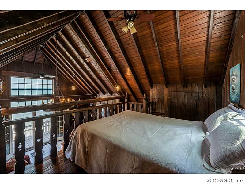 630 Rock Beach Road Irondequoit, NY 14617 - Photo 16 of 25 Bedroom. Beach House Loft Bedroom over looking the