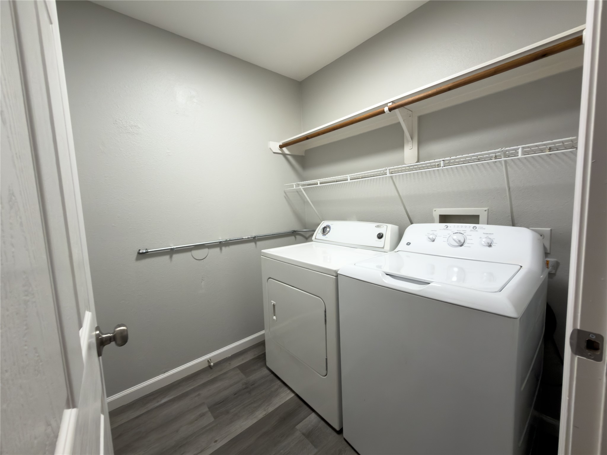 6626 Springfield Garden Lane Spring, TX 77379 - Photo 12 of 23 a utility room with dryer and washer