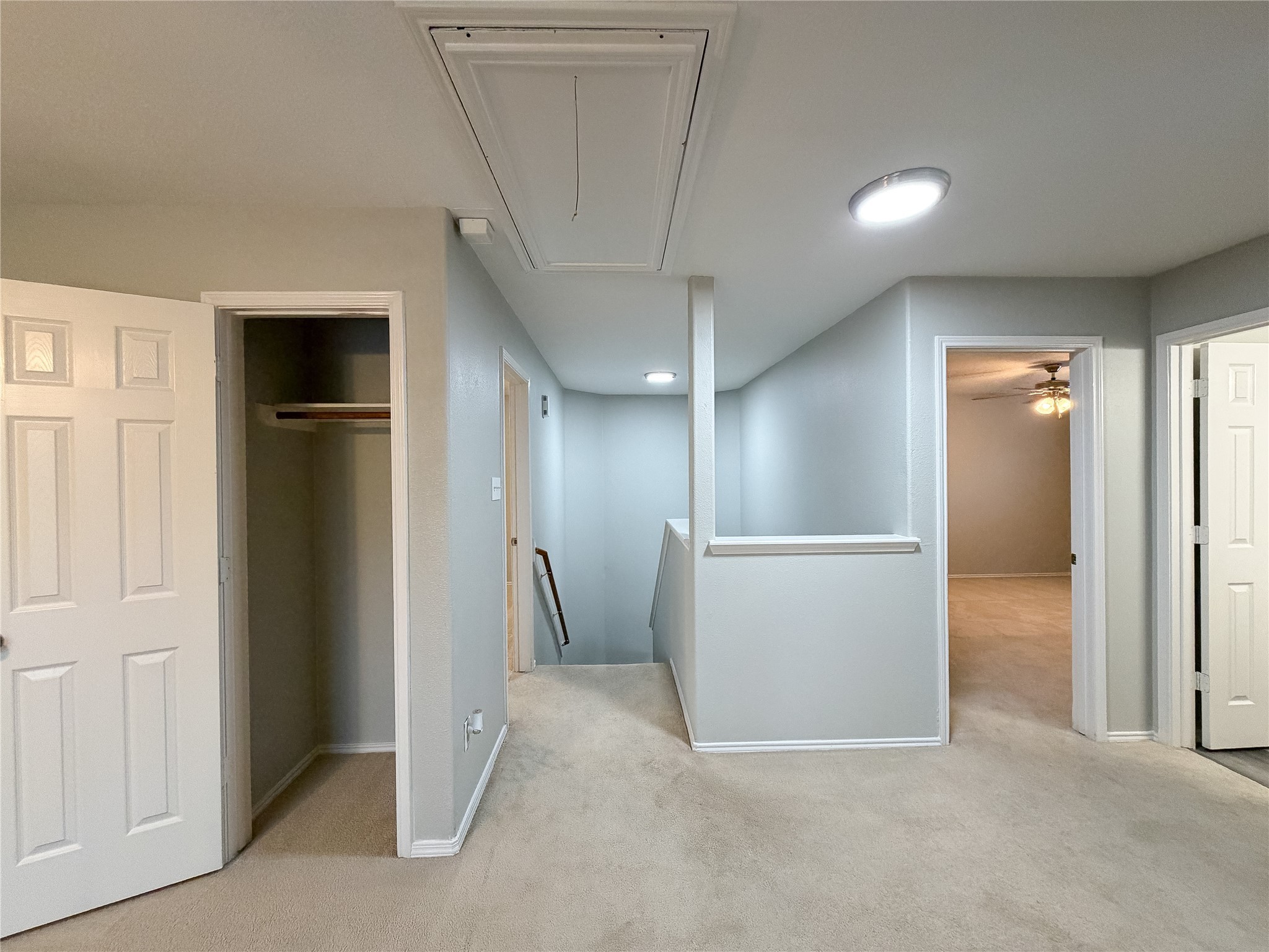 6626 Springfield Garden Lane Spring, TX 77379 - Photo 18 of 23 an empty room with closet and wooden door