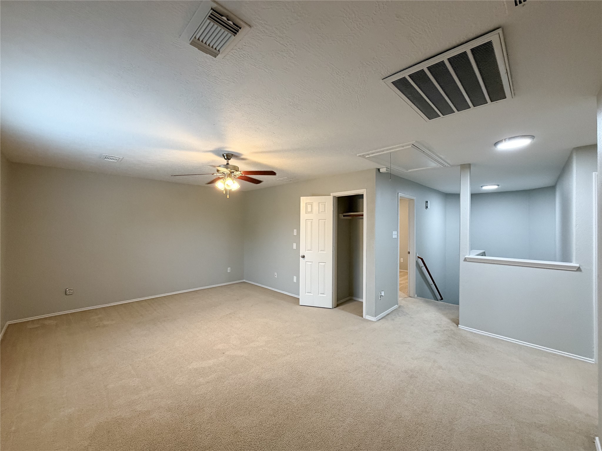 6626 Springfield Garden Lane Spring, TX 77379 - Photo 19 of 23 an empty room with projector and fan