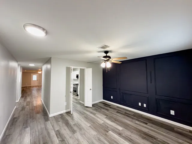 a view of a livingroom with a furniture