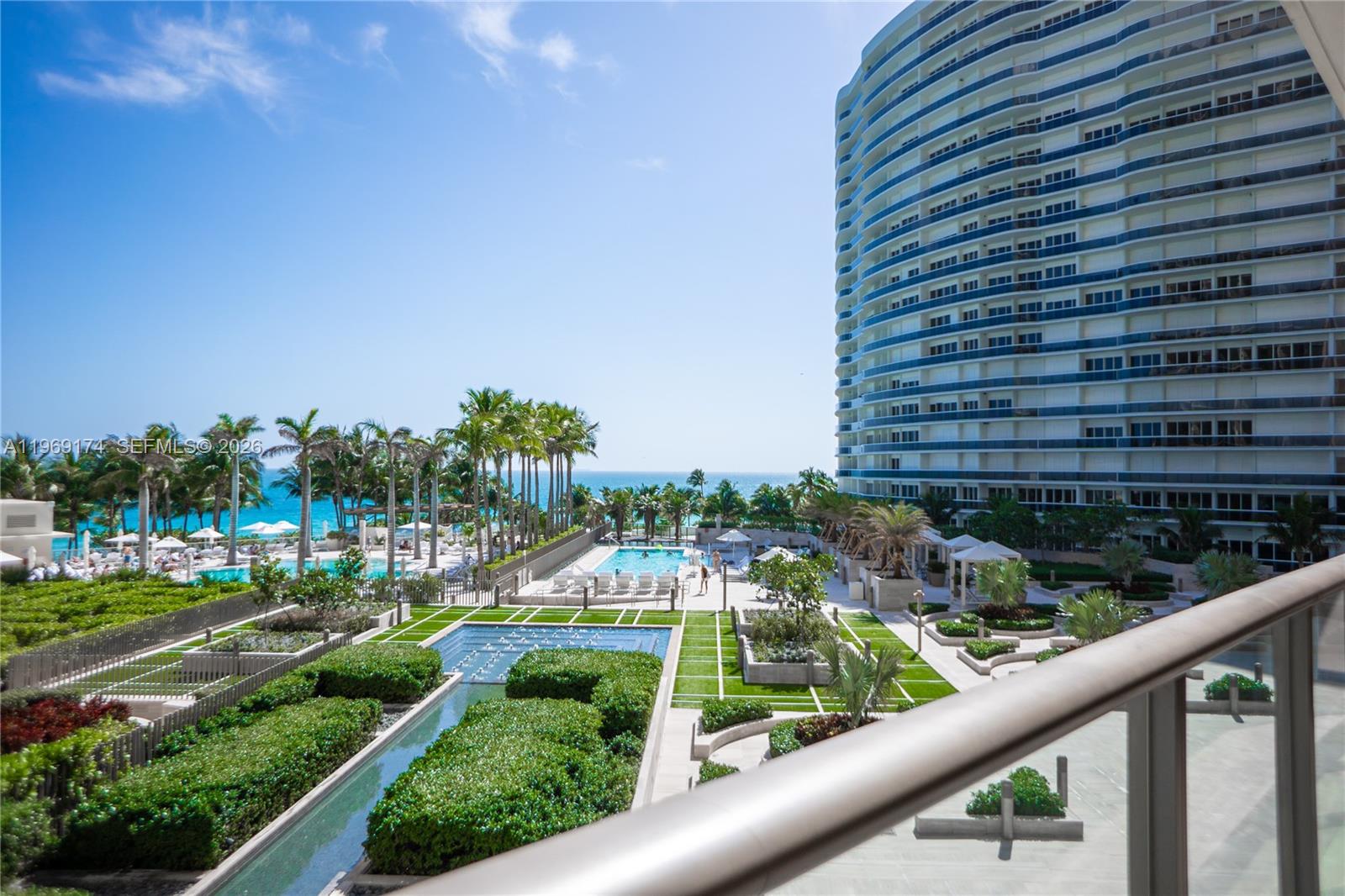 9701 Collins Avenue, Unit 404S Bal Harbour, FL 33154 - Photo 22 of 40 a view of a balcony with yard