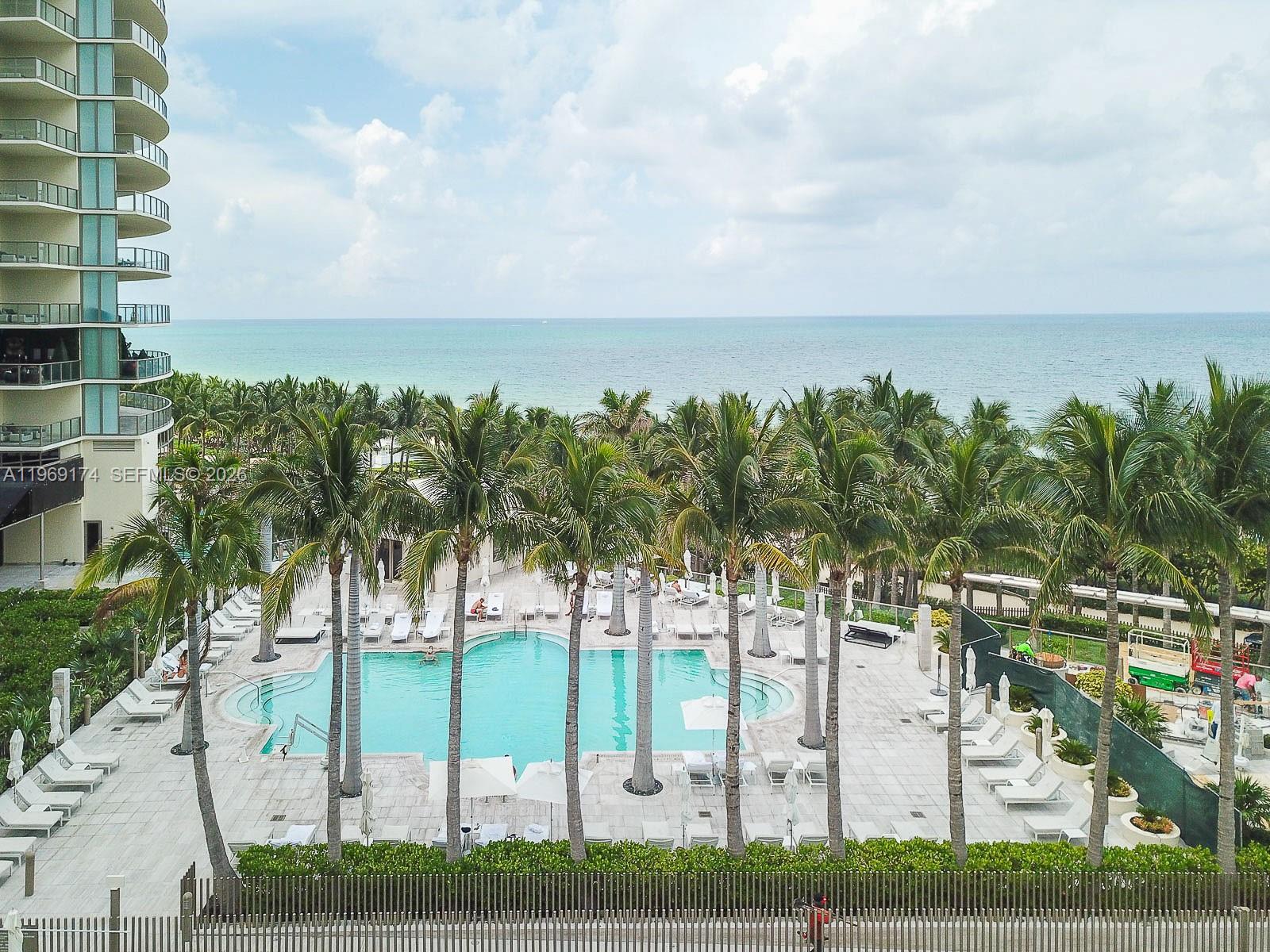 9701 Collins Avenue, Unit 404S Bal Harbour, FL 33154 - Photo 34 of 40 a view of a city with palm trees
