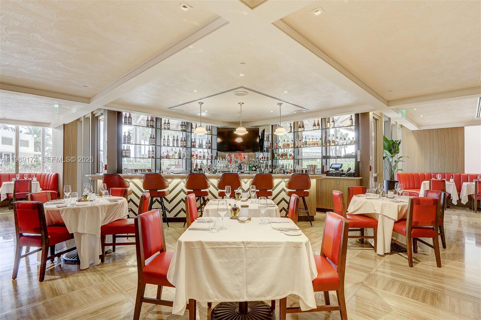 9701 Collins Avenue, Unit 404S Bal Harbour, FL 33154 - Photo 37 of 40 a view of a dining room with furniture window and outside view