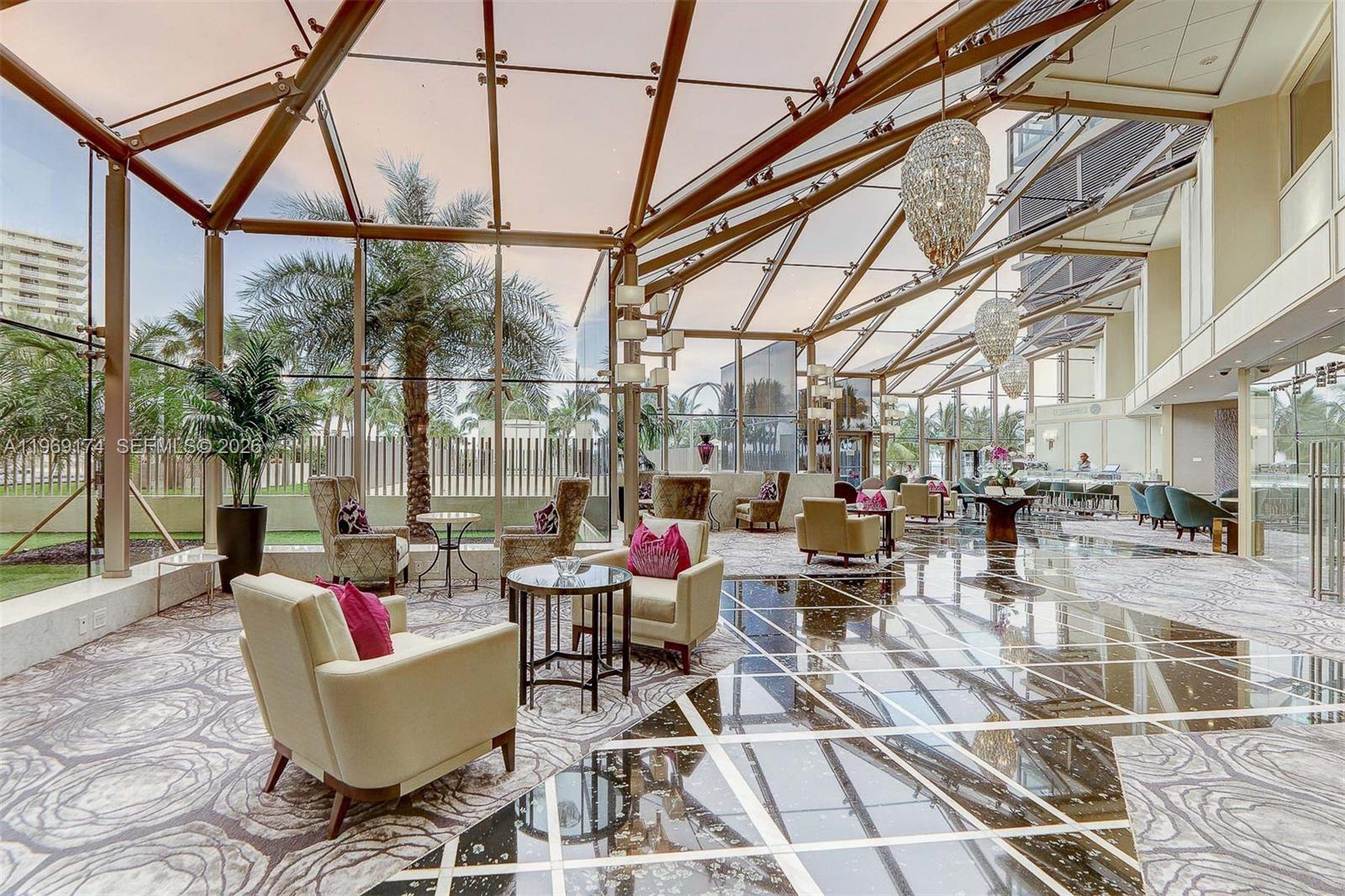 9701 Collins Avenue, Unit 404S Bal Harbour, FL 33154 - Photo 38 of 40 a outdoor space with lots of tables and chairs