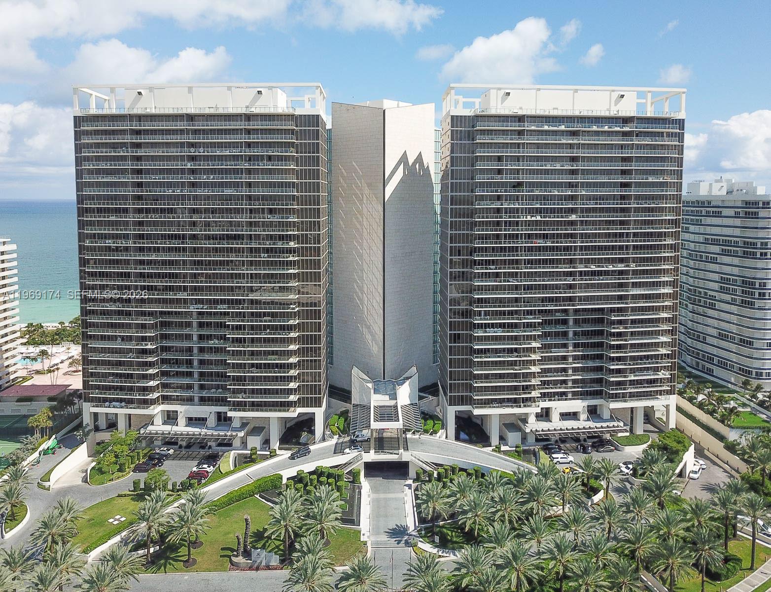 9701 Collins Avenue, Unit 404S Bal Harbour, FL 33154 - Photo 39 of 40 a view of building with a street