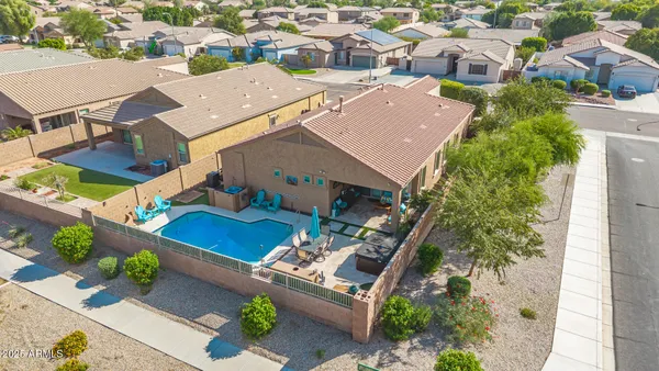 an aerial view of a house with a garden