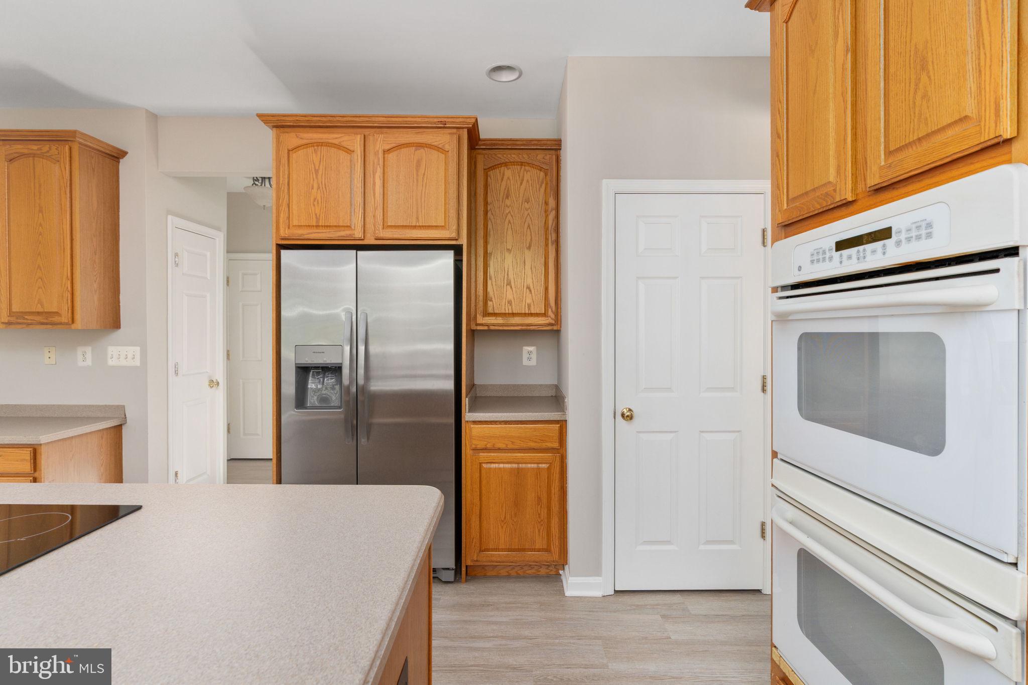 55 Hamstead Road Fredericksburg, VA 22405 - Photo 20 of 58 a kitchen with stainless steel appliances a refrigerator and cabinets
