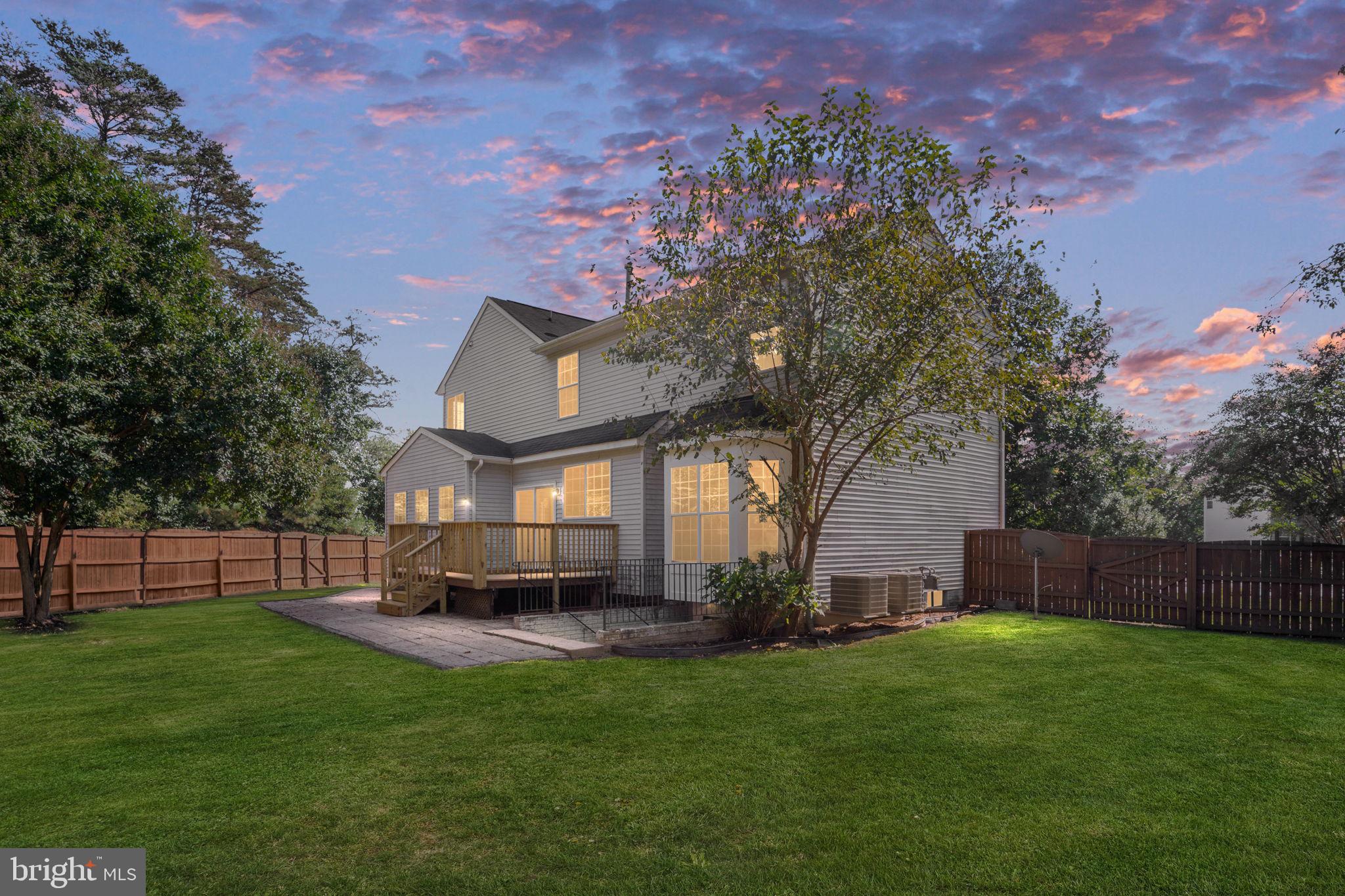 55 Hamstead Road Fredericksburg, VA 22405 - Photo 2 of 58 a view of a yard with a large tree in a yard