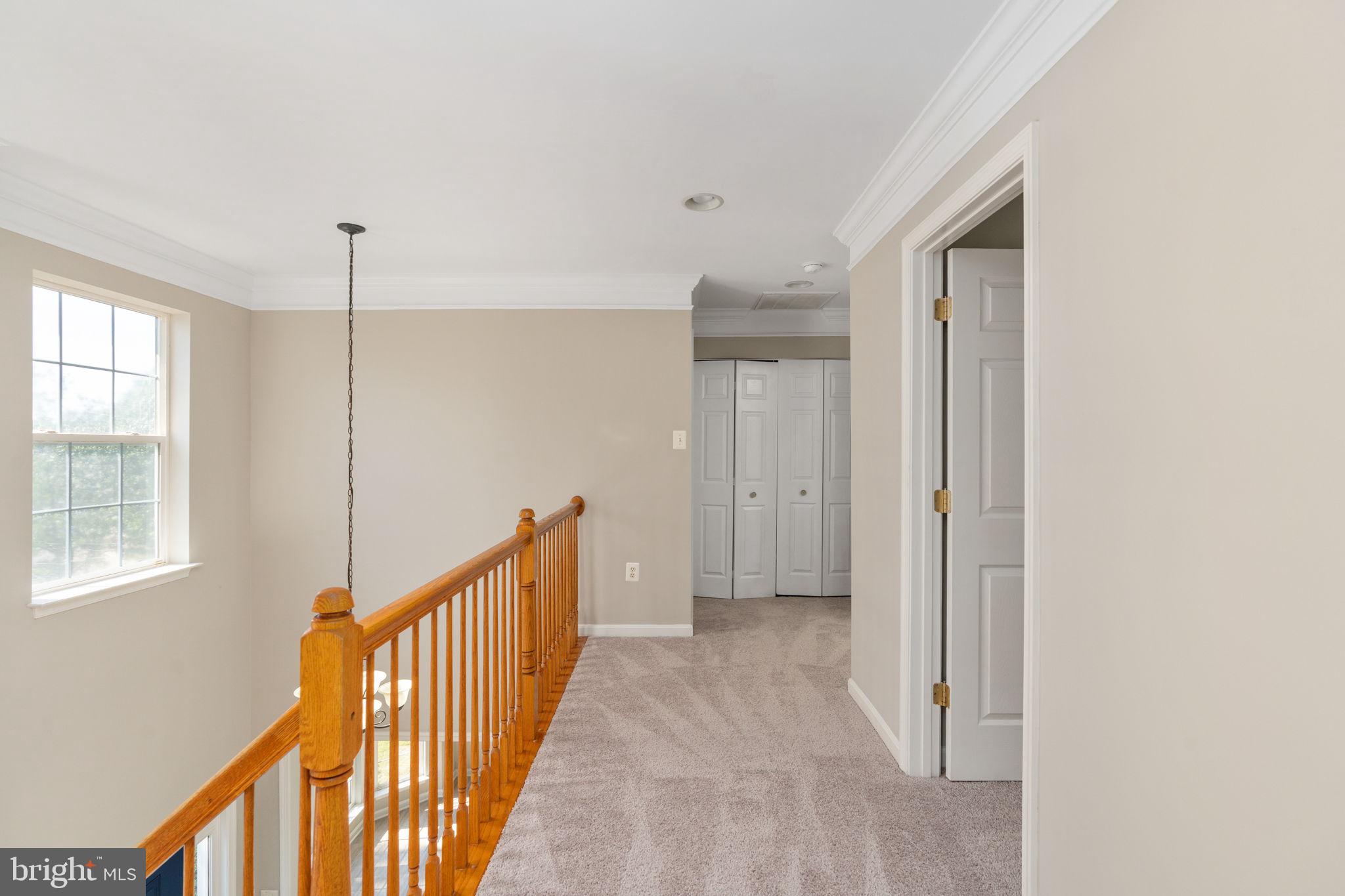 55 Hamstead Road Fredericksburg, VA 22405 - Photo 29 of 58 a view of a hallway with windows