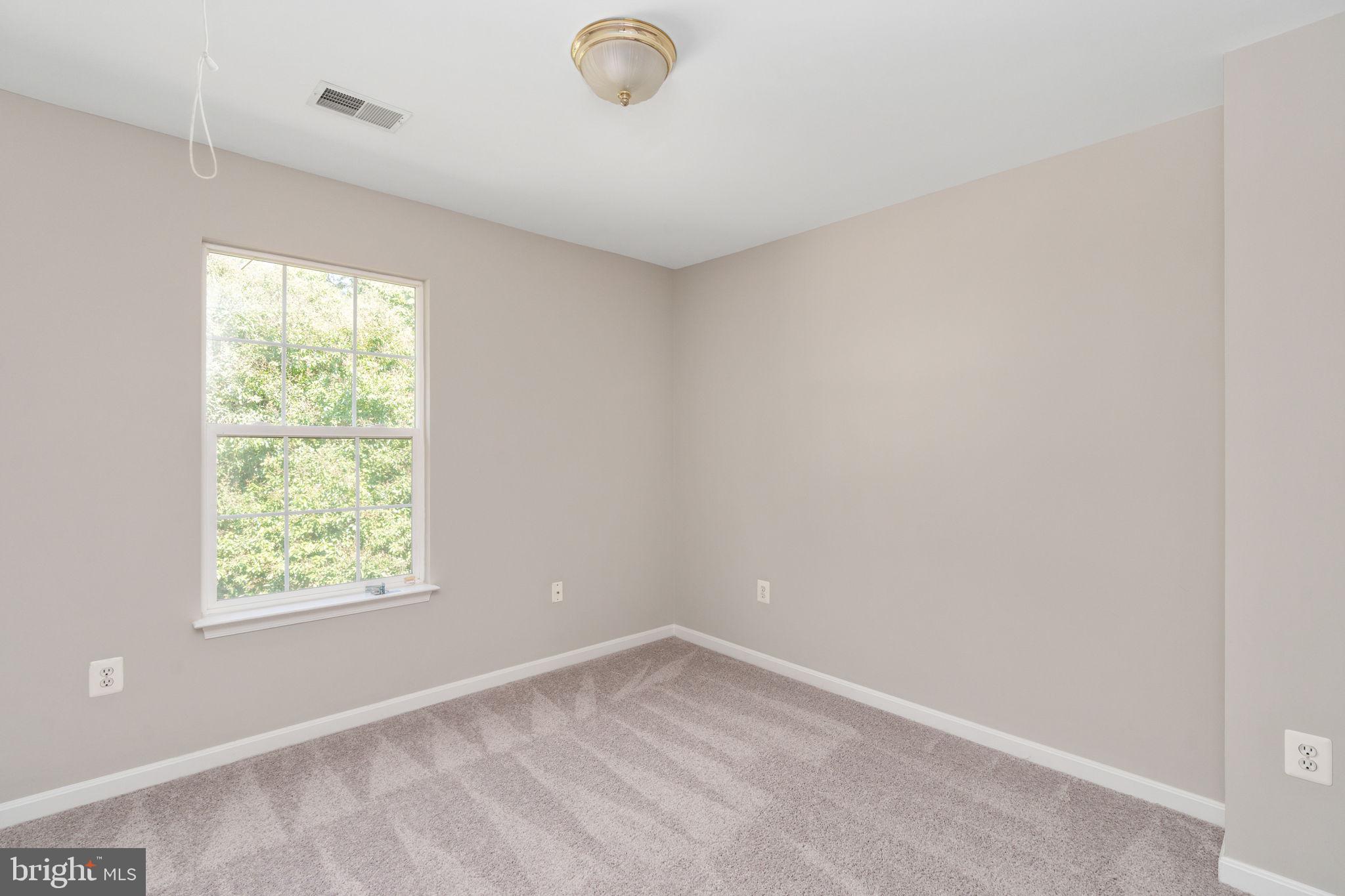 55 Hamstead Road Fredericksburg, VA 22405 - Photo 37 of 58 an empty room with a window