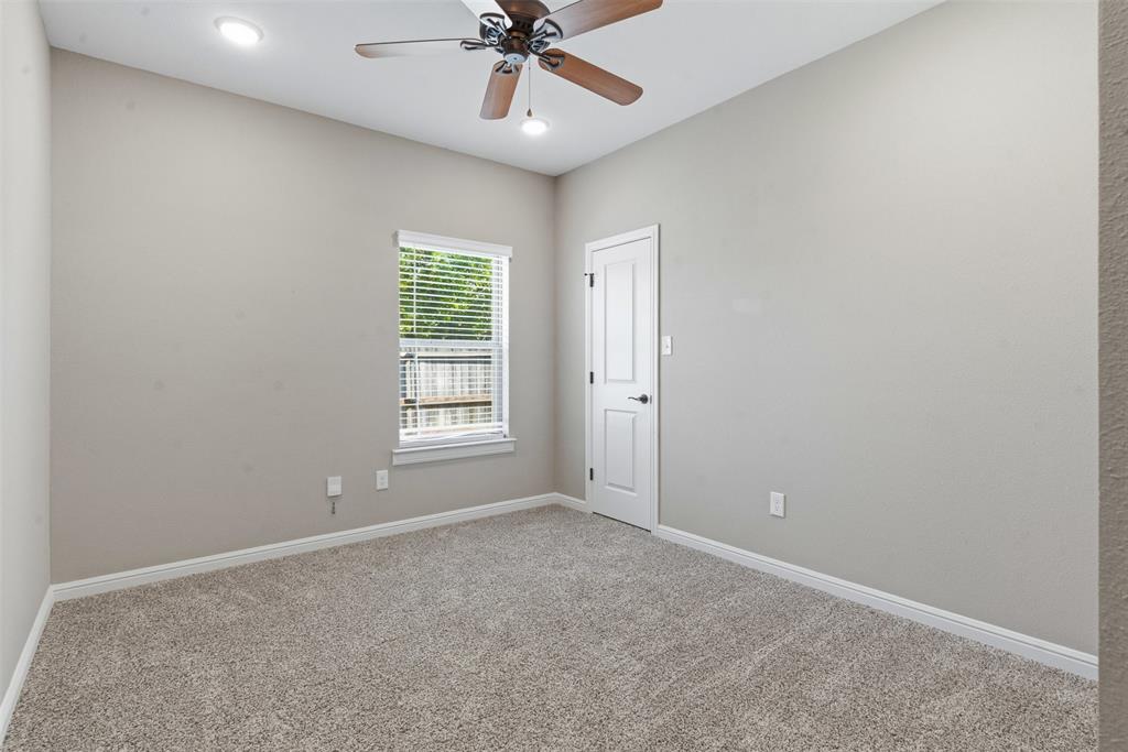 1617 Hawthorne Street Cleburne, TX 76033 - Photo 14 of 40 a view of an empty room with a window