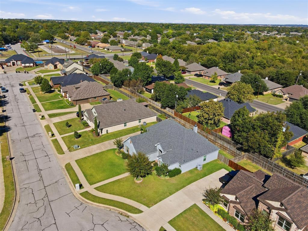 1617 Hawthorne Street Cleburne, TX 76033 - Photo 40 of 40 an aerial view of residential houses with outdoor space