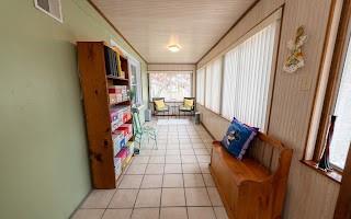 228 Clover Street Pittsburgh, PA 15210 - Photo 11 of 46 a hallway with a large window
