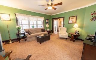 228 Clover Street Pittsburgh, PA 15210 - Photo 15 of 46 a living room with furniture and a window