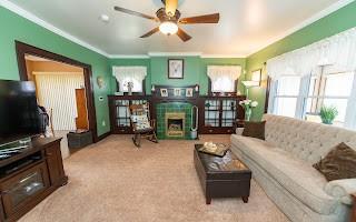 228 Clover Street Pittsburgh, PA 15210 - Photo 20 of 46 a living room with furniture and a flat screen tv