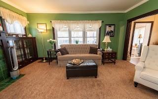 228 Clover Street Pittsburgh, PA 15210 - Photo 22 of 46 a living room with furniture and a flat screen tv