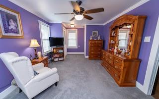 228 Clover Street Pittsburgh, PA 15210 - Photo 24 of 46 a living room with furniture and a flat screen tv