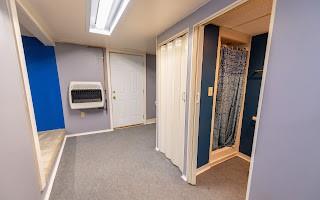 228 Clover Street Pittsburgh, PA 15210 - Photo 30 of 46 a view of a hallway with some storage and utility