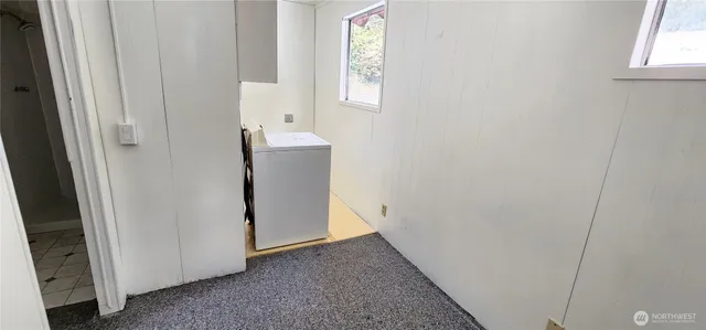 a view of a hallway with closet
