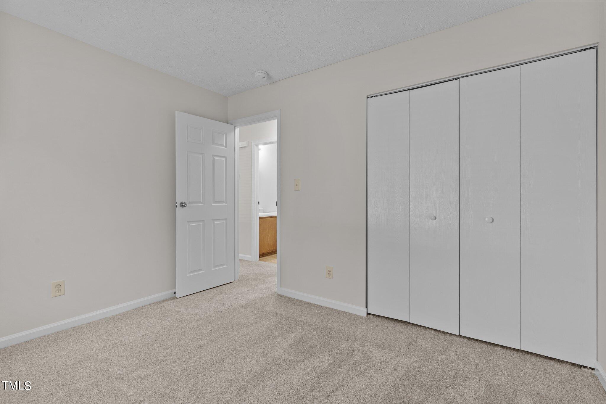 5104 Duckworth Court Raleigh, NC 27616 - Photo 14 of 36 a view of an empty room