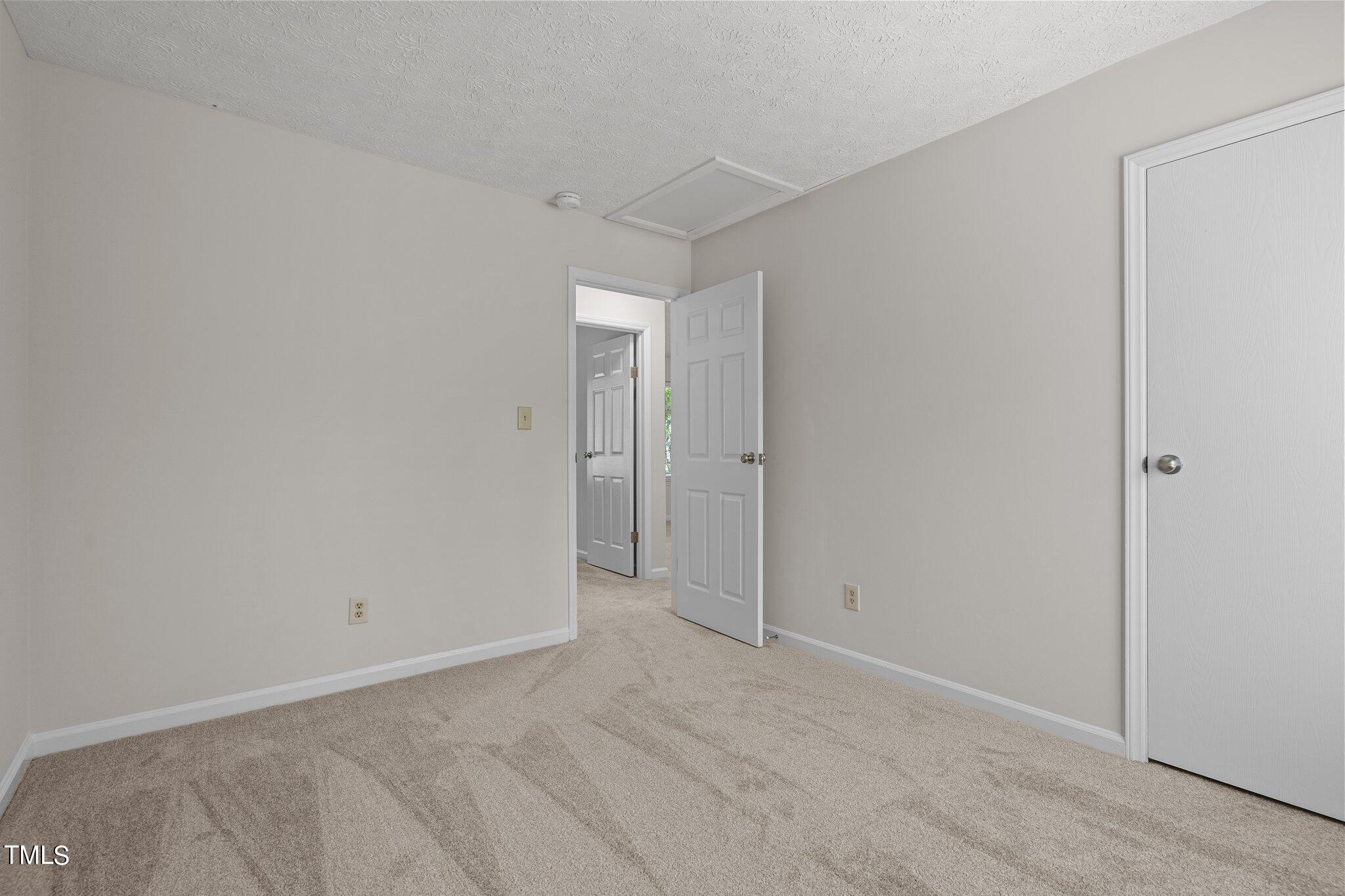 5104 Duckworth Court Raleigh, NC 27616 - Photo 19 of 36 a view of an empty room