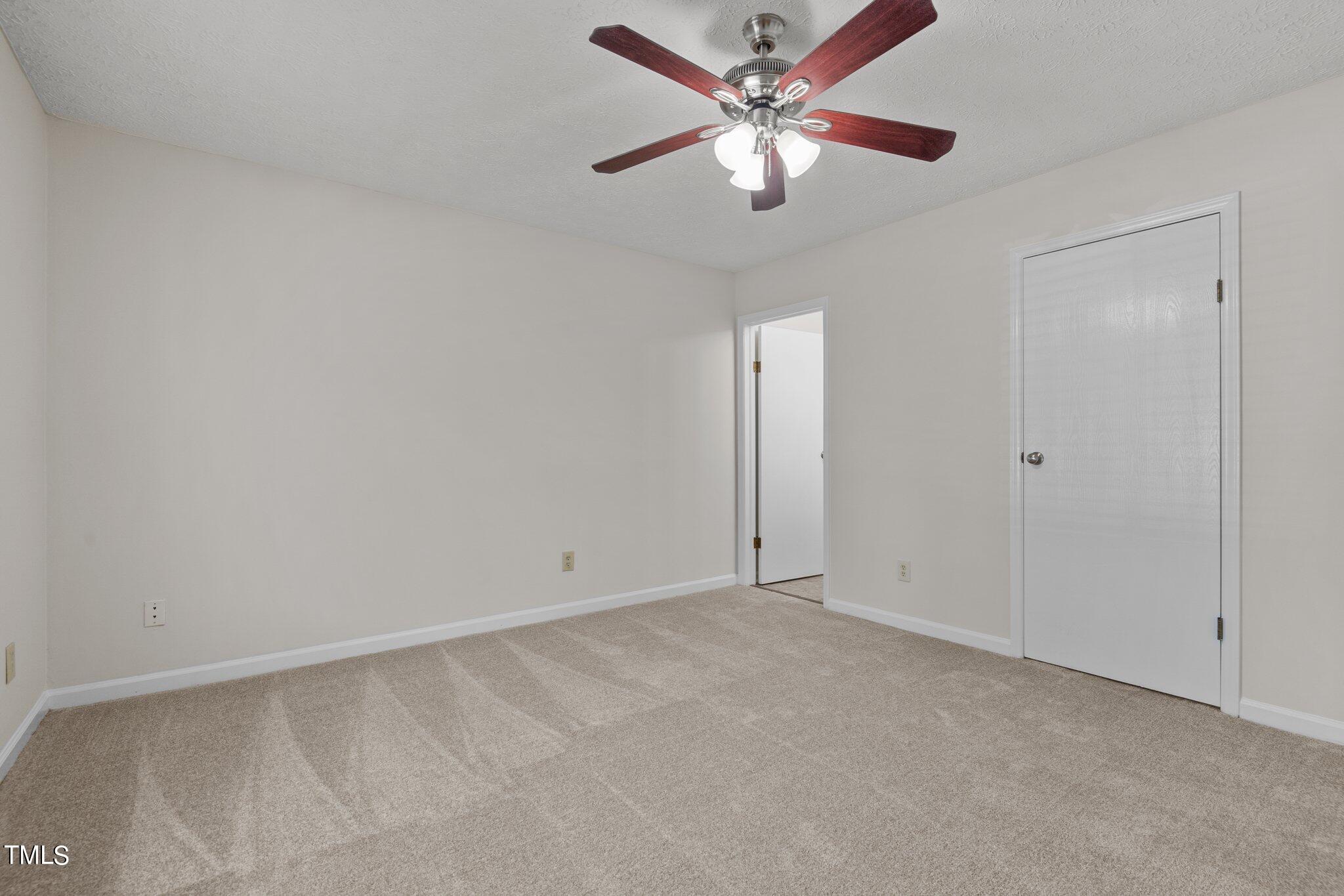 5104 Duckworth Court Raleigh, NC 27616 - Photo 22 of 36 a view of an empty room