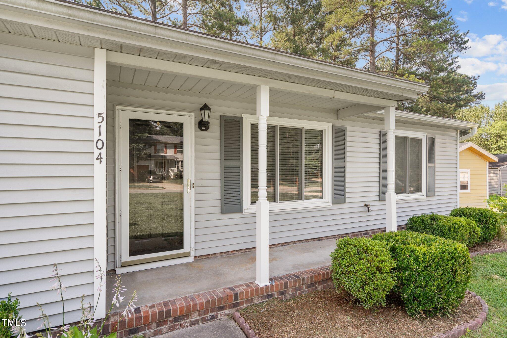 5104 Duckworth Court Raleigh, NC 27616 - Photo 33 of 36 a view of house with a porch