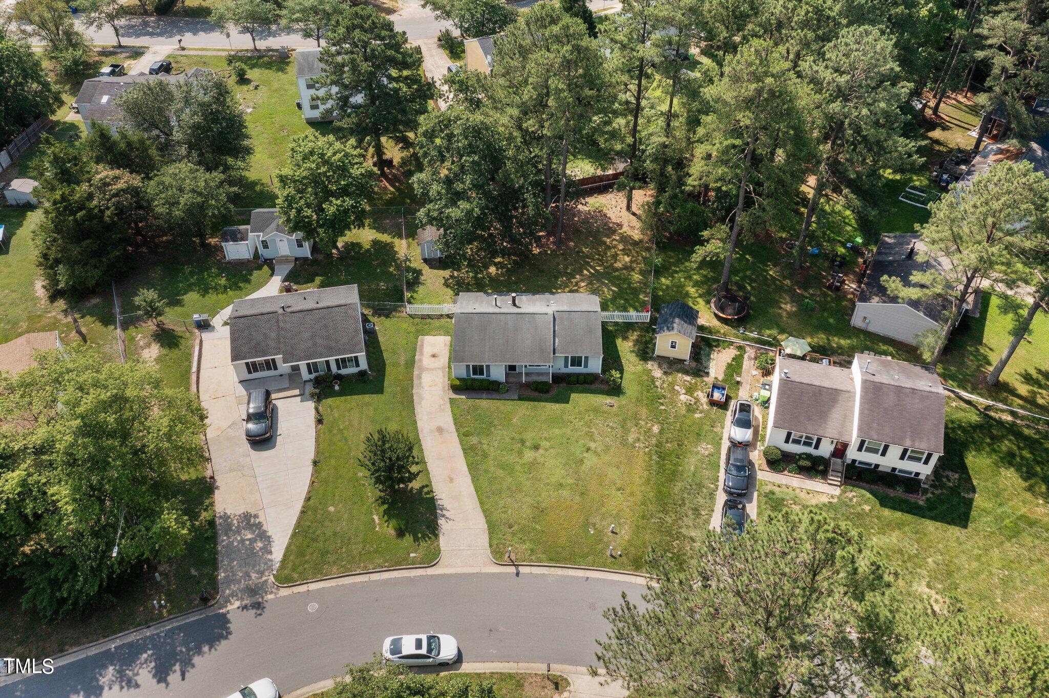 5104 Duckworth Court Raleigh, NC 27616 - Photo 35 of 36 an aerial view of a house with a yard