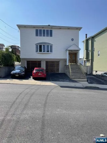 a bedroom with furniture and a fireplace
