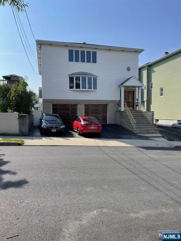 a cars parked in front of a building