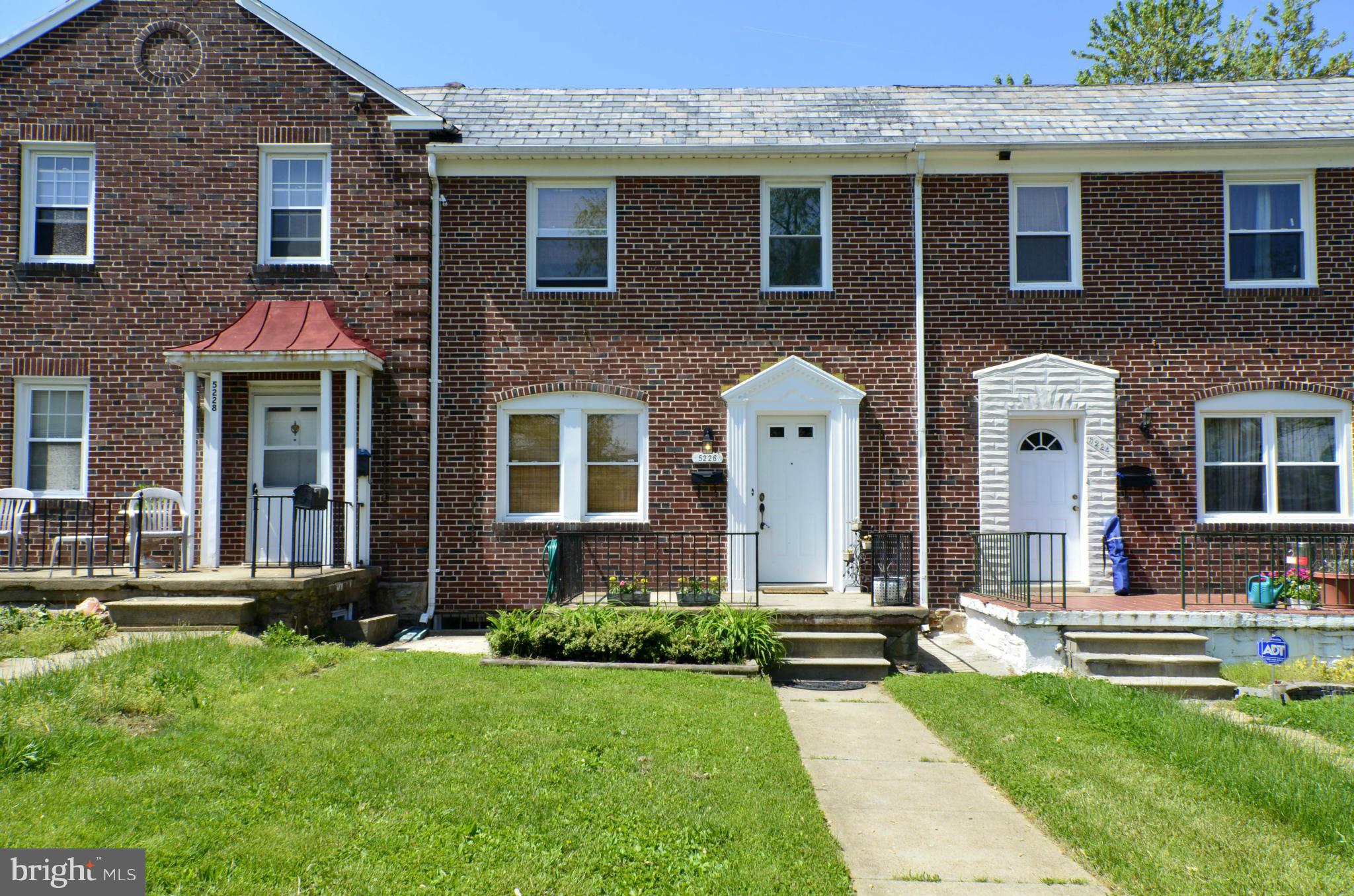 5226 Cromarty Road Baltimore, MD 21229 - Photo 1 of 30 a front view of a house with garden
