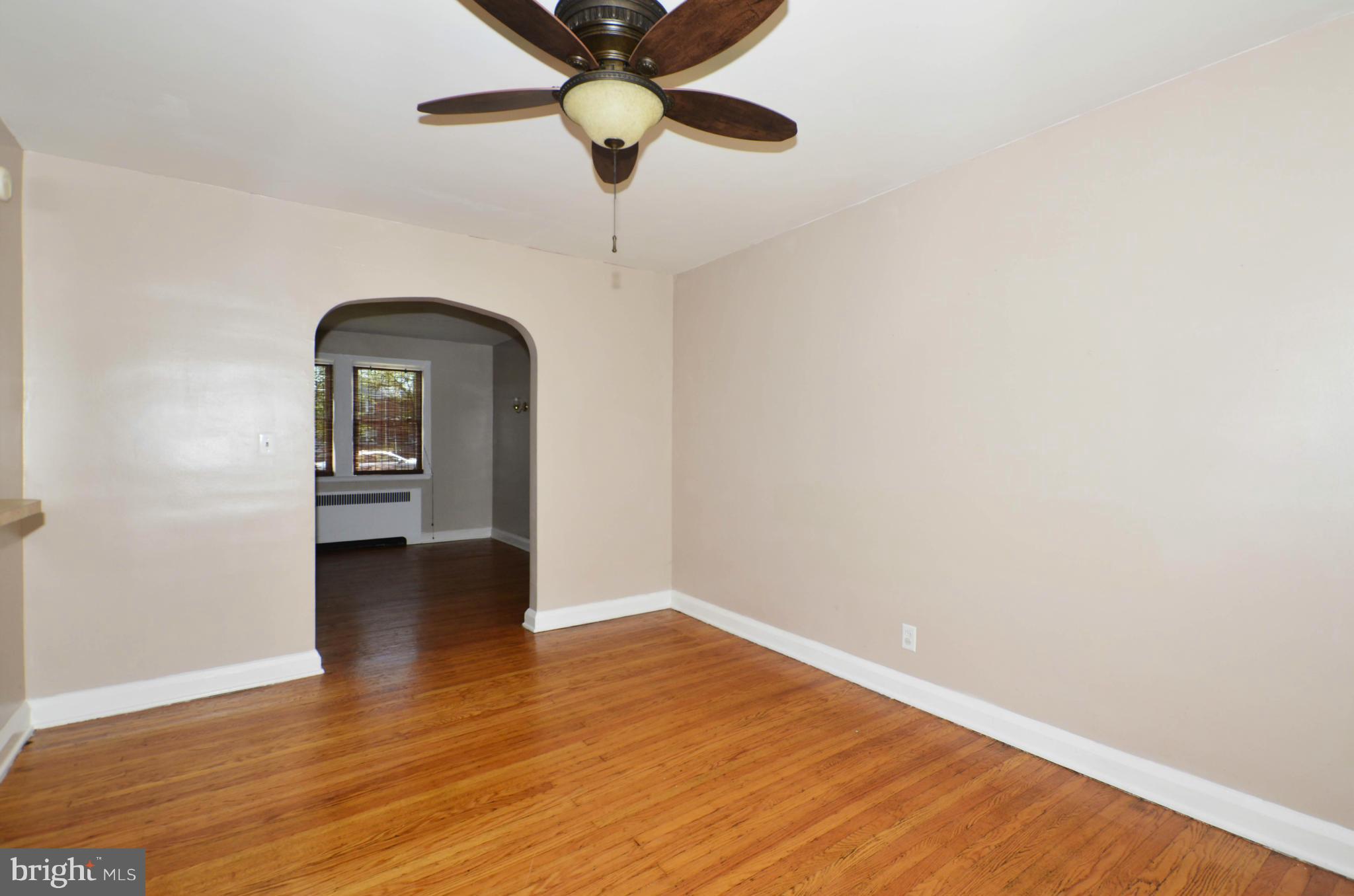 5226 Cromarty Road Baltimore, MD 21229 - Photo 9 of 30 wooden floor in an empty room