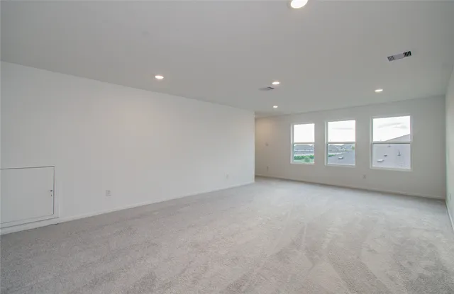 a view of an empty room with window