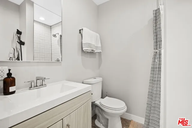 a bathroom with a sink and a toilet