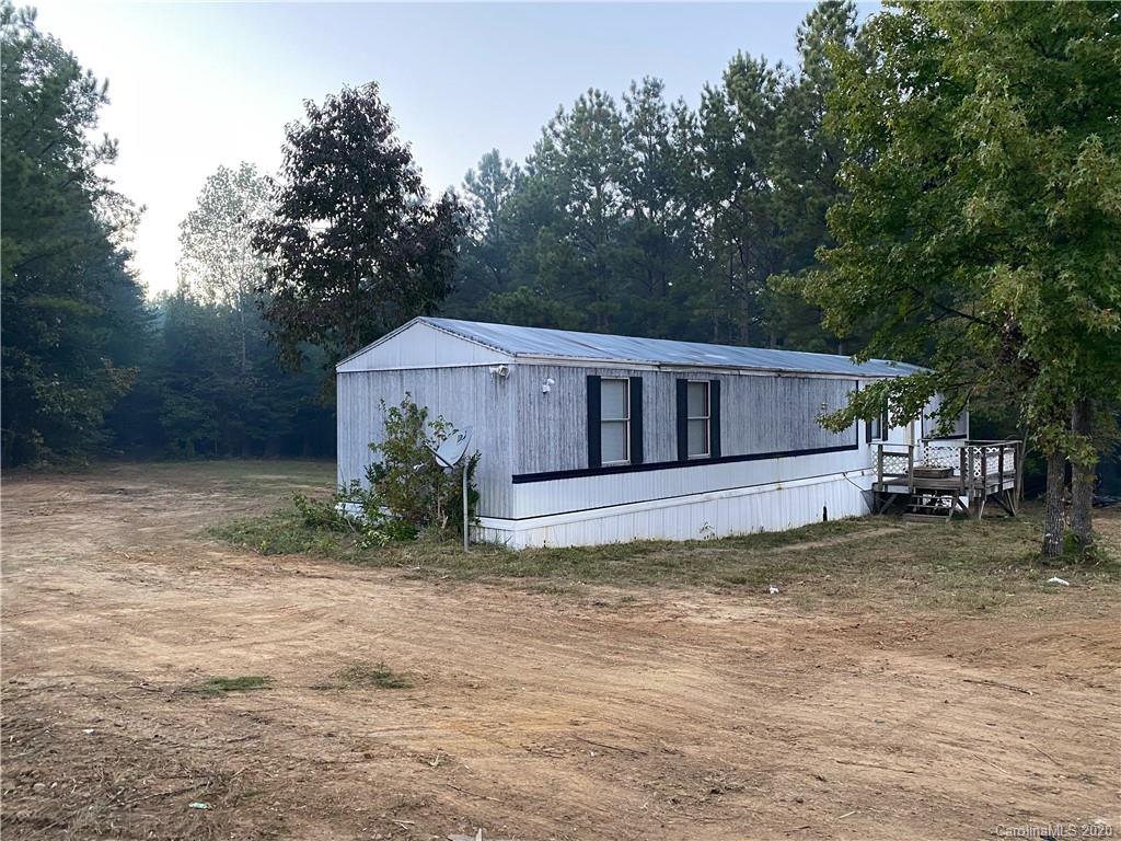1562 Dunlap Roddey Road Rock Hill, SC 29730 - Photo 13 of 14 a view of a house with a large window and a yard