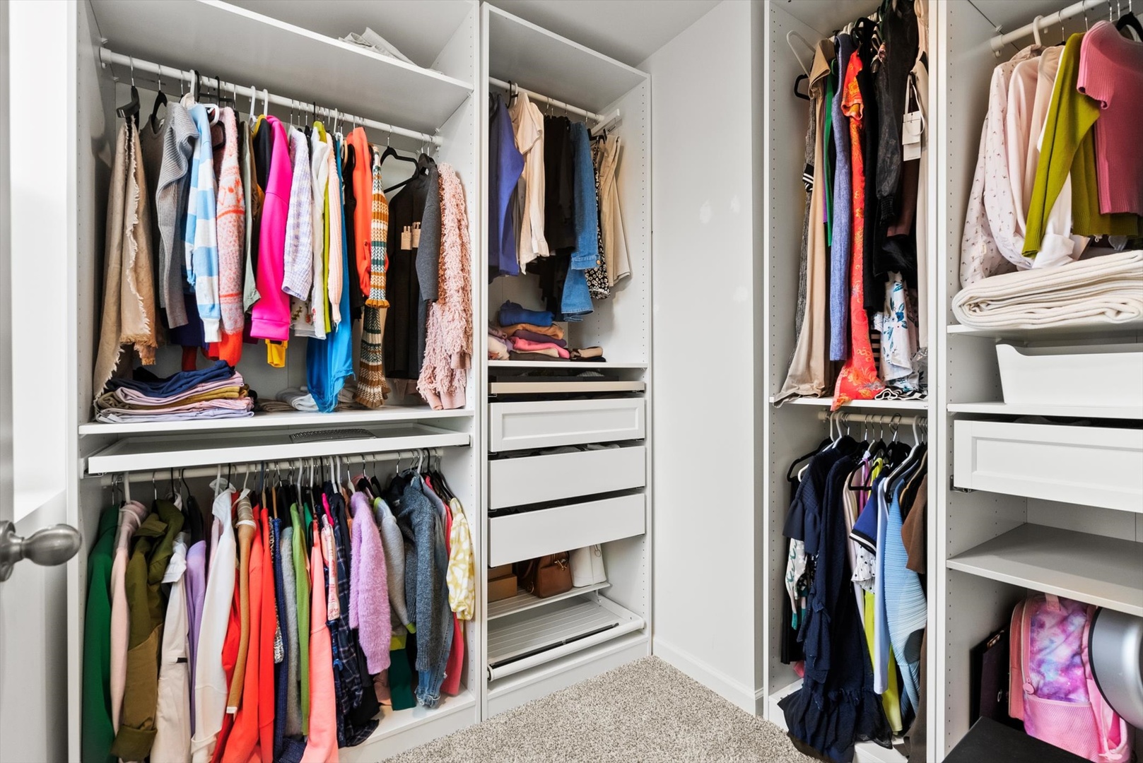 343 Summit Circle, Unit 343 Lombard, IL 60148 - Photo 15 of 23 a view of walk in closet with clothes and shoes