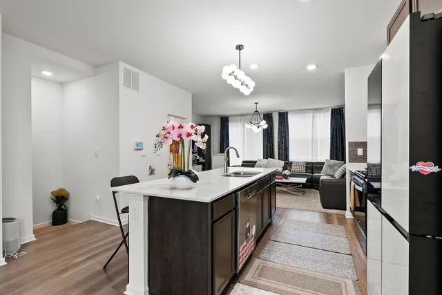 a view of a hallway with washer and dryer