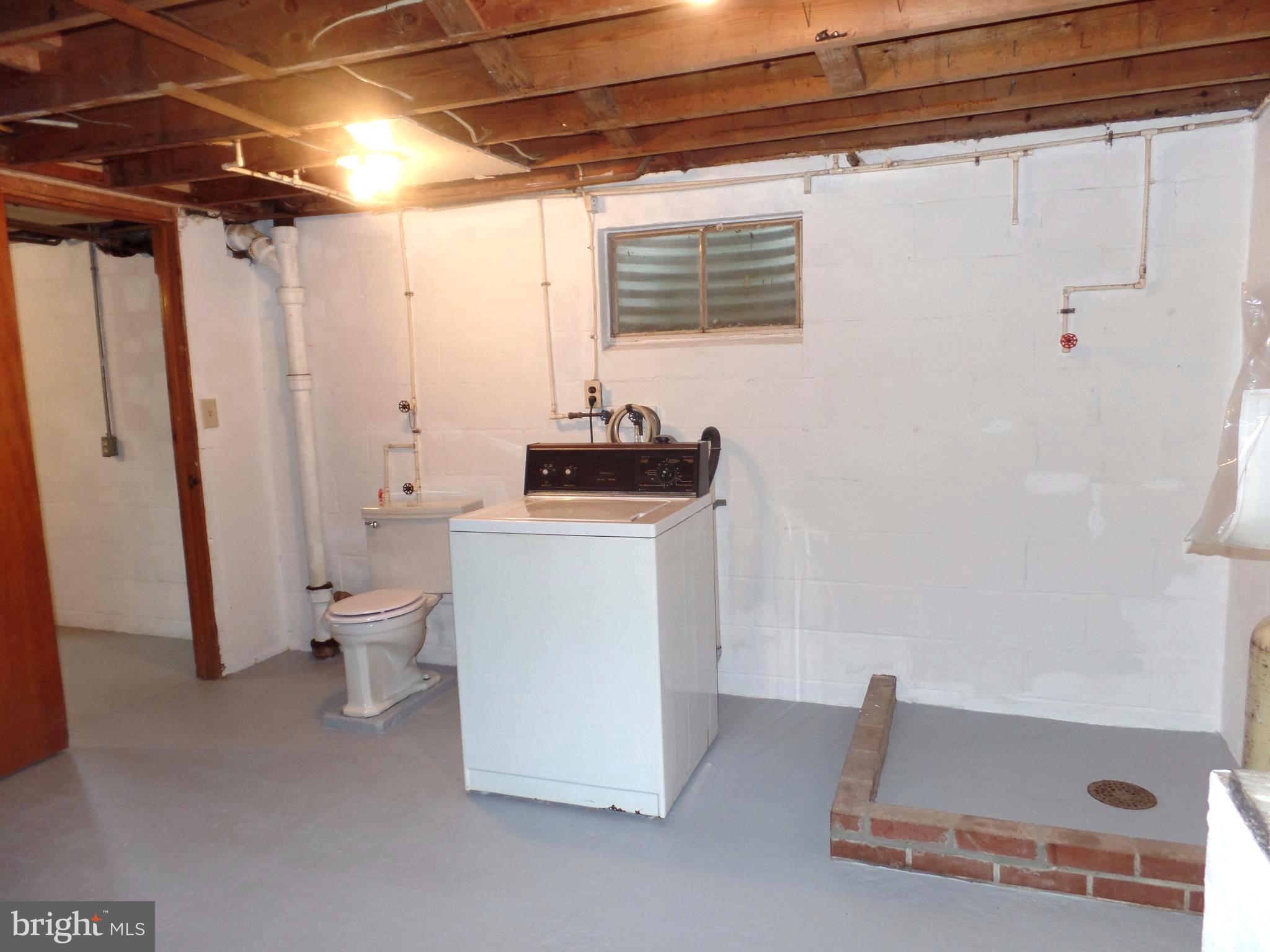 1636 Exeter Road Westminster, MD 21157 - Photo 18 of 23 a room with a toilet and a shower
