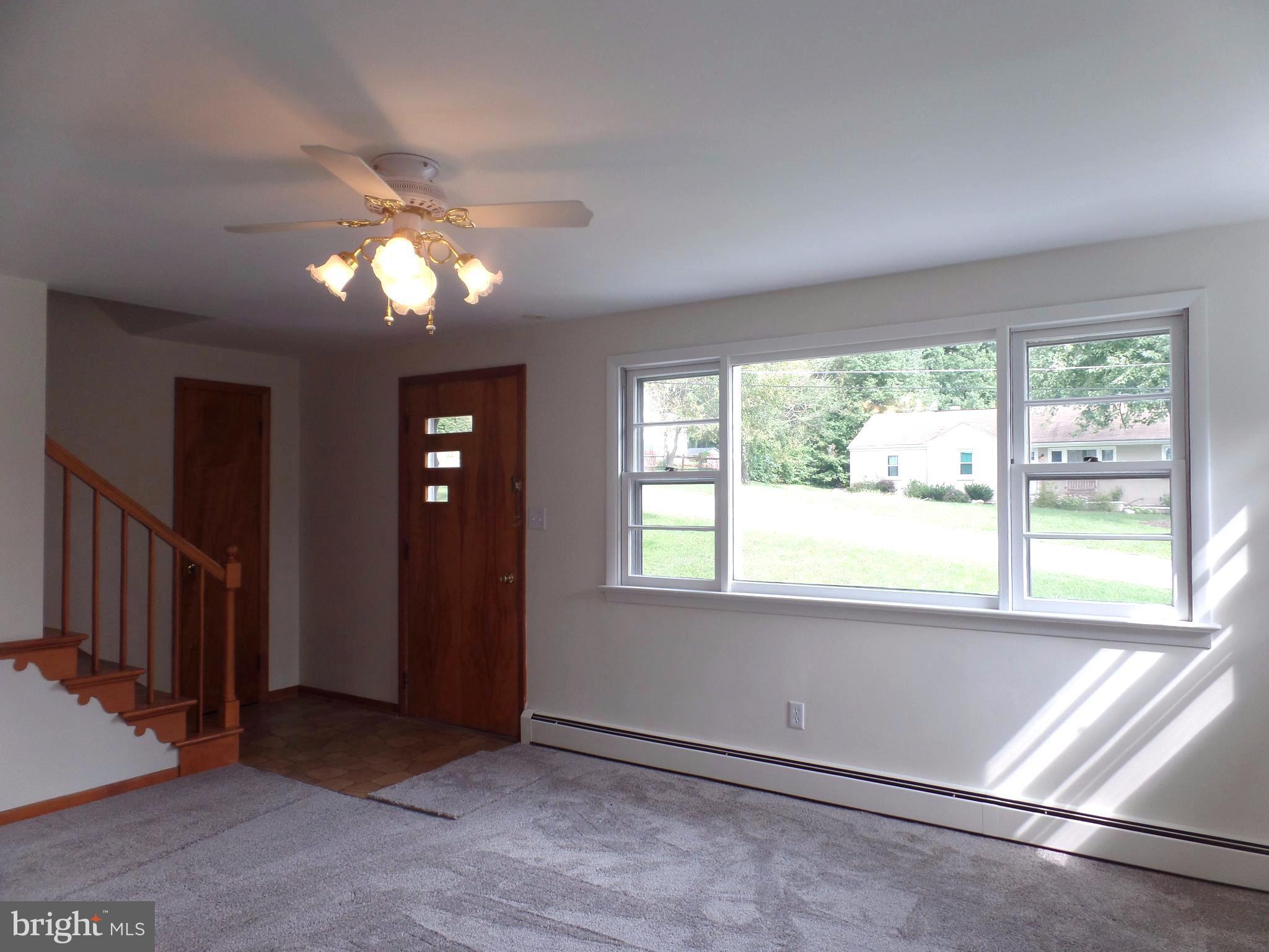 1636 Exeter Road Westminster, MD 21157 - Photo 3 of 23 a view of an empty room with a window