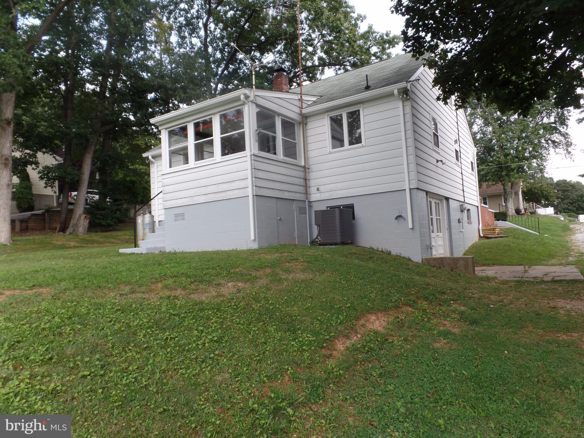 1636 Exeter Road Westminster, MD 21157 - Photo 21 of 23 a front view of a house with a garden