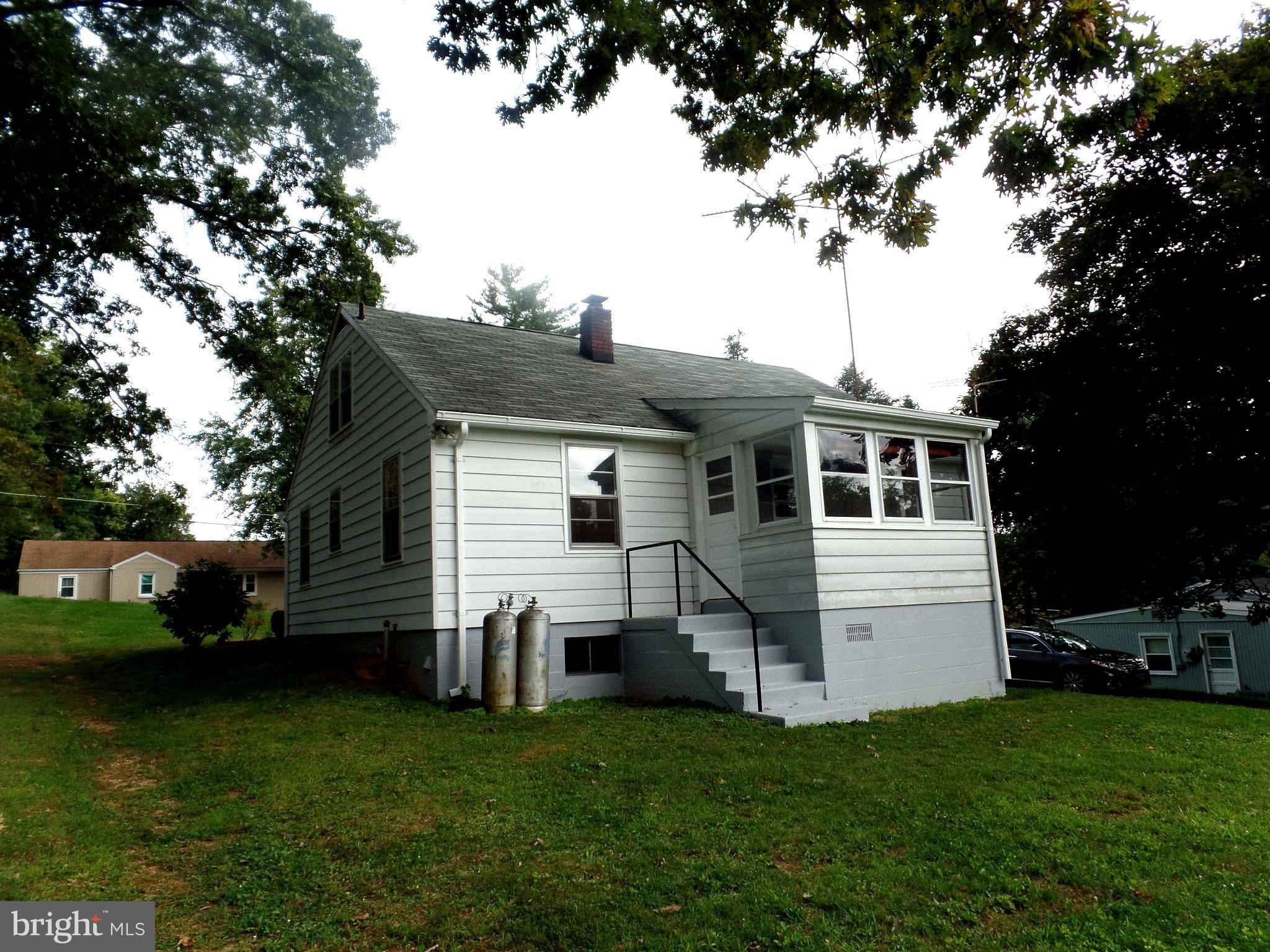 1636 Exeter Road Westminster, MD 21157 - Photo 23 of 23 a front view of house with a garden